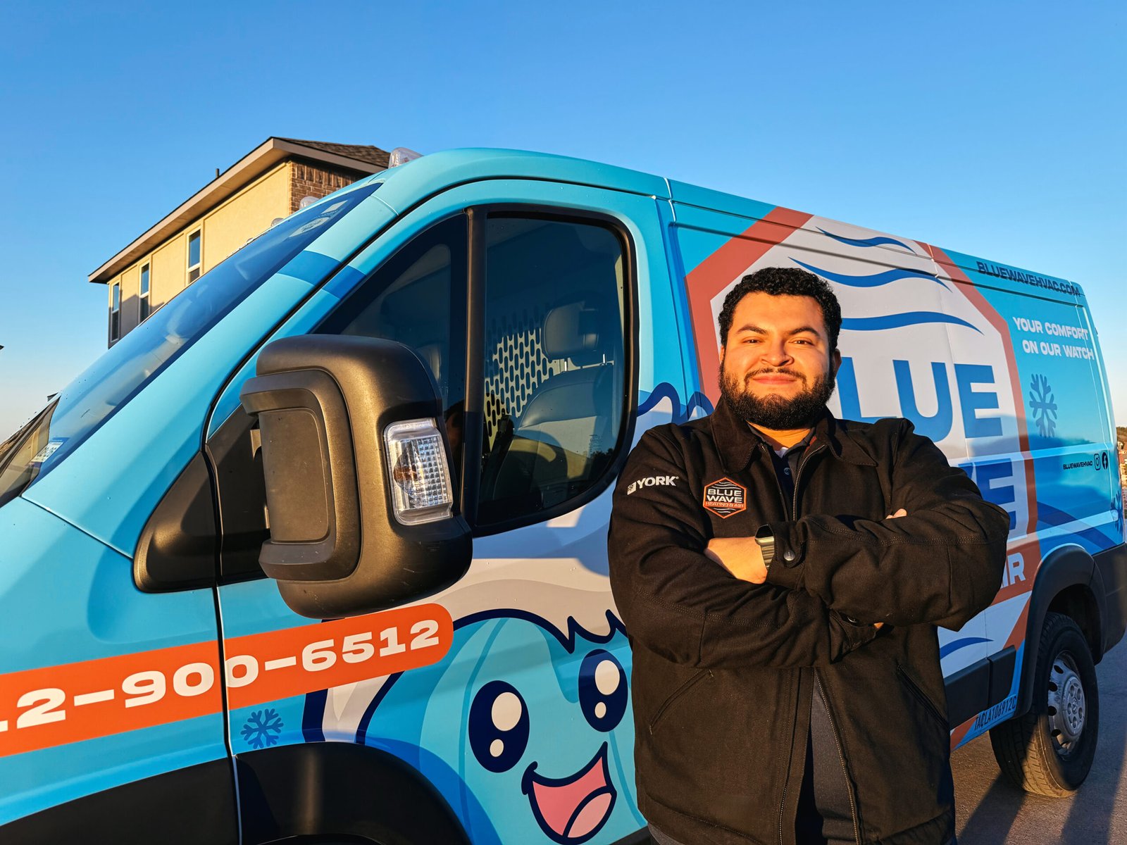 AC Technician standing in front of Work Van